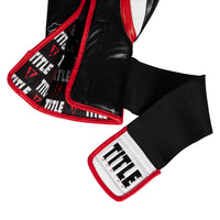 variant:lifestyle::TITLE Boxing Gel Generation Leather Bag Gloves closeup of glove strap