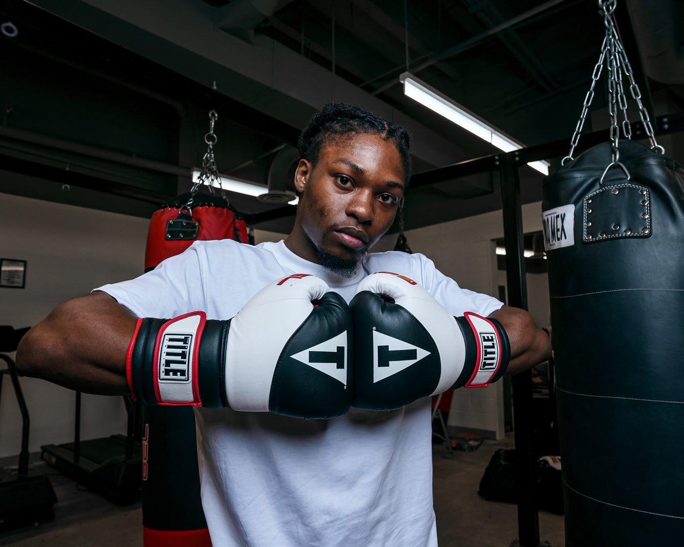 variant:Black/White::TITLE Boxing Gel Suspense Training Gloves boxer hands together