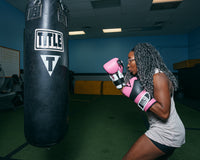 variant:Pink/Black::TITLE Boxing Gel Suspense Training Gloves lady boxing pose