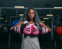 variant:Pink/Black::TITLE Boxing Gel Suspense Training Gloves lady hands together