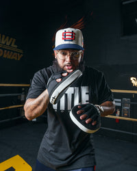 variant:lifestyle::TITLE Boxing Gel Tech Punch Mitts 2.0  coach with mitts
