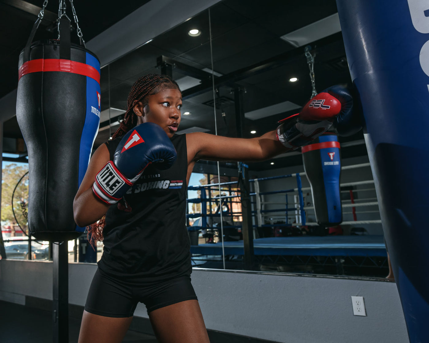 variant:navy/red::TITLE Boxing Gel World V2T Bag Gloves right jab to bag