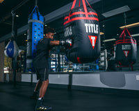 variant:black/gold::Adidas Box Hog 4 Boxing Boots kid hitting ring
