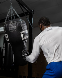 variant:black::TITLE Boxing Big Bang Heavy bag guy hitting bag left hook