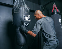 variant:black::TITLE Boxing Big Bang Heavy bag guy hitting bag left hook uppercut bag