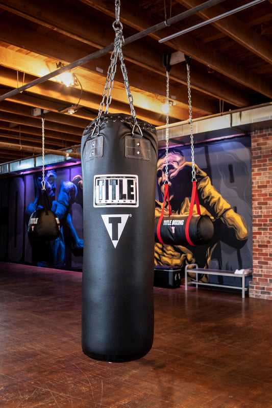 TITLE Boxing Professional Choice 125lb Leather Heavy Bag sitting in old retail store