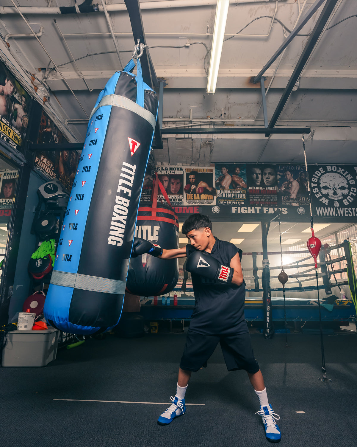 variant:150 lbs::TITLE Boxing Greatest Heavy Bag Ever boy hitting bag