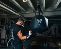 variant:lifestyle::TITLE Boxing Body Snatcher Bag back picture of guy with bag