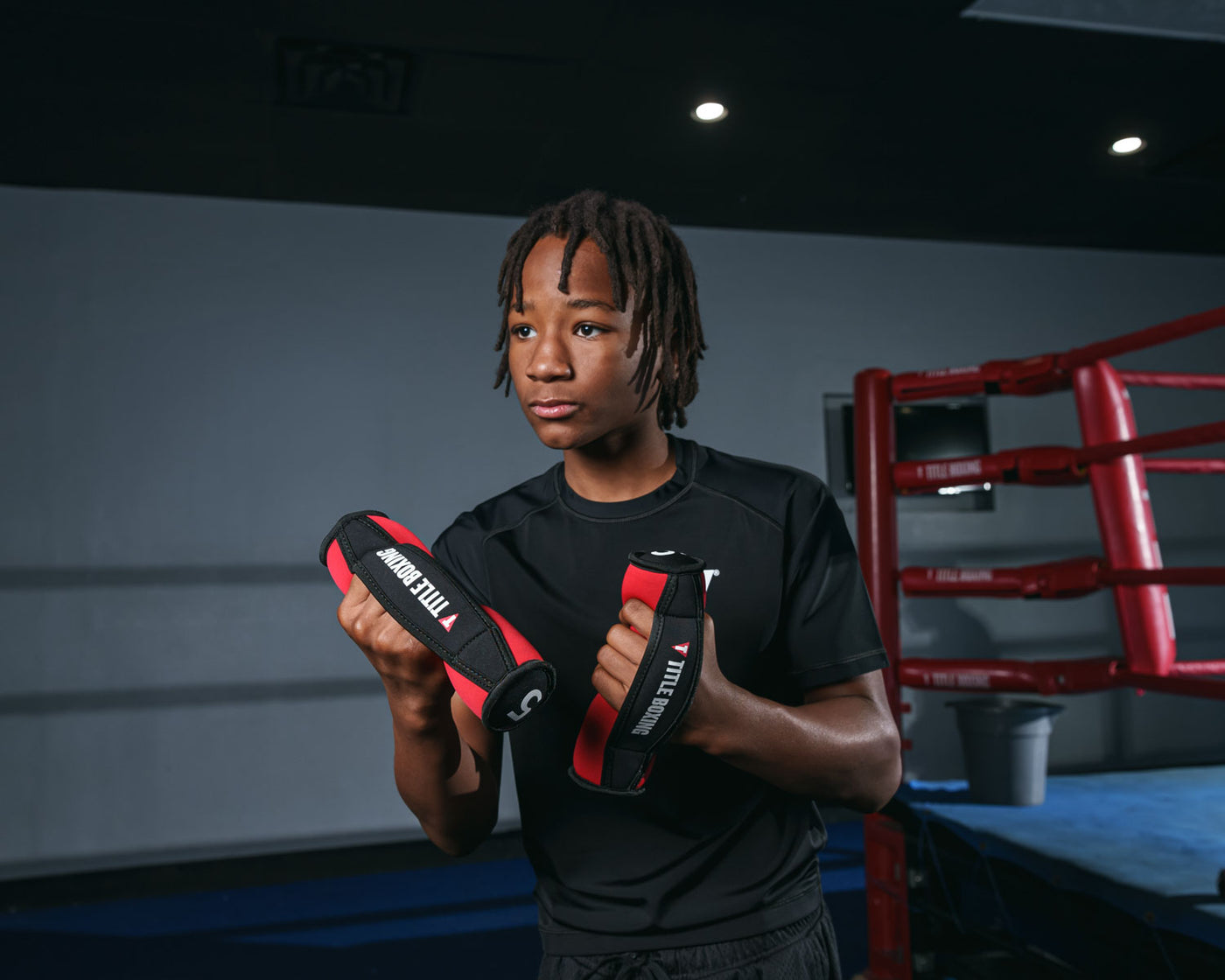 variant:5::TITLE Boxing Heavy-Hitter Hand Weights 2.0 kid holding 5 lbs