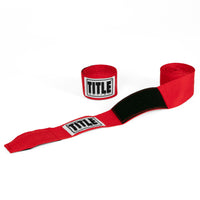 variant:red::TITLE Boxing Traditional Weave 180" Hand Wraps pair view with one wrap unrolled