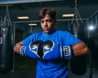 variant:blue/black::TITLE Boxing Infused Foam Interrogate Training Gloves 2.0 hands together