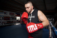 variant:Red/White::TITLE Boxing Inferno Intensity Lace Training Gloves guy boxing pose 