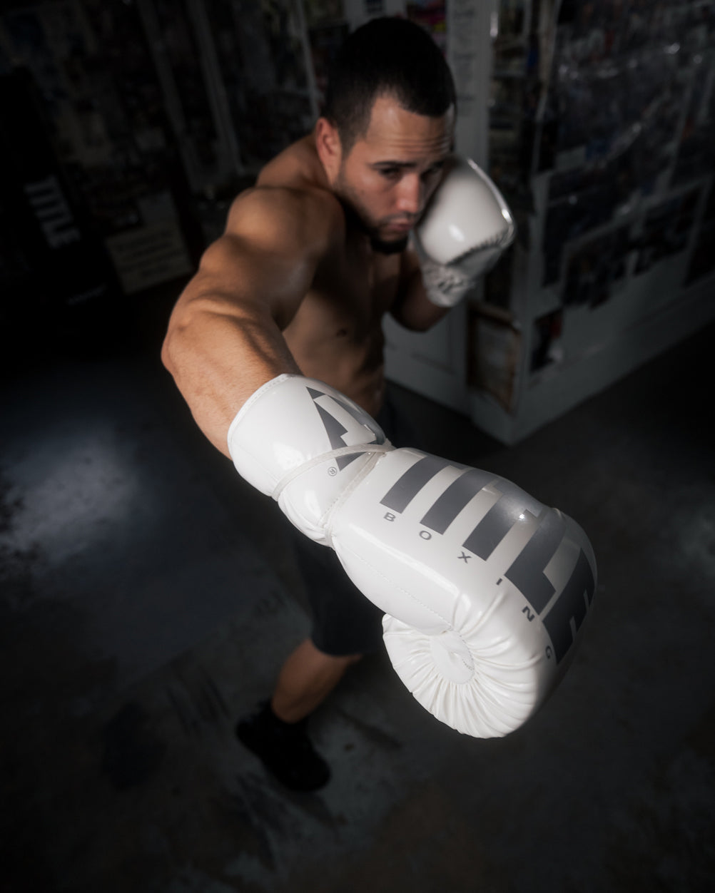 variant:White::TITLE Boxing Inferno Intensity Lace Training Gloves top view of glove in air