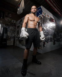 variant:White::TITLE Boxing Inferno Intensity Lace Training Gloves hands down boxing stance