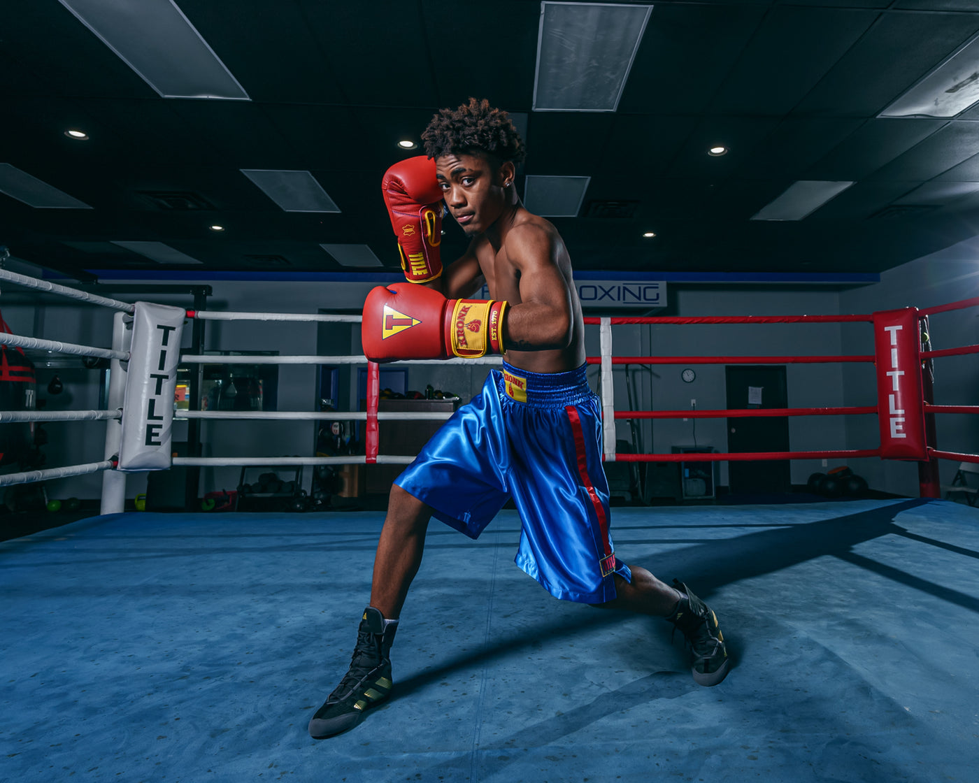 variant:blue::KRONK Boxing Gym Trunks standing in ring boxing stance