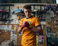 variant:red::KRONK Boxing Gym Hand Wraps guy standing together