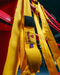 variant:gold::KRONK Boxing Gym Hand Wrap wraps hanging