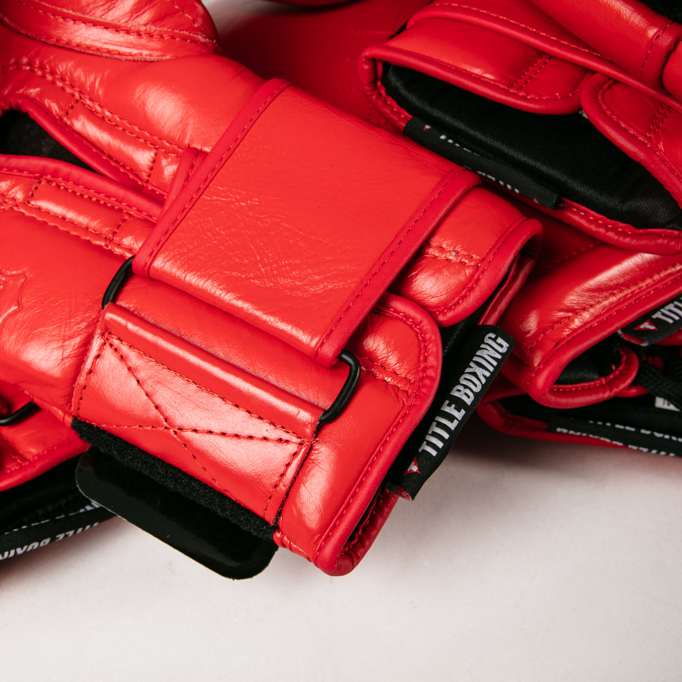variant:red::TITLE Boxing Ko-Vert Bag Boxing Gloves closeup of wrist