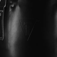 variant:black::TITLE Boxing KO-Vert Heavy Bag closeup of logo