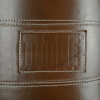 variant:brown::TITLE Boxing KO-Vert Leather Heavy Bag closeup of logo