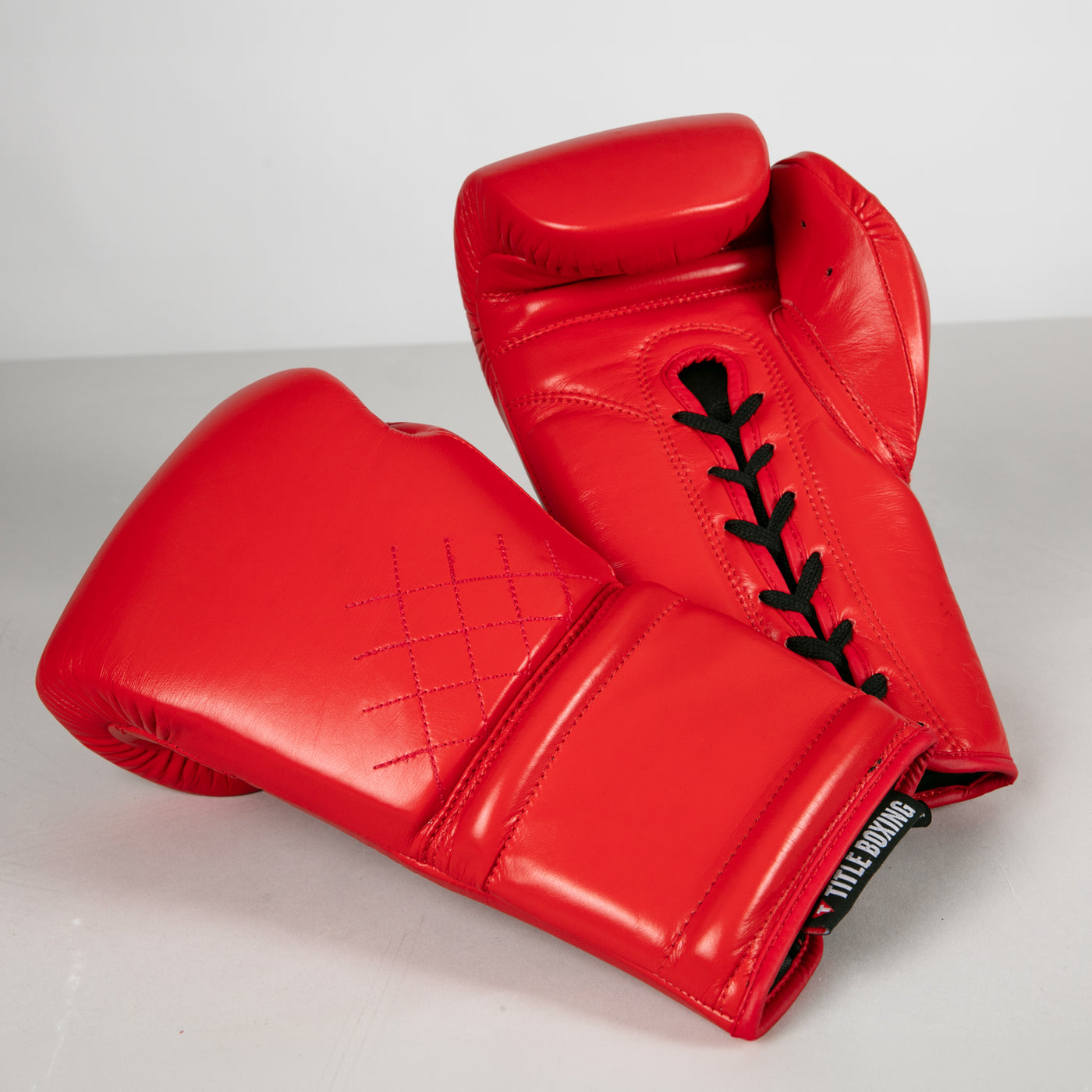 variant:red::TITLE Boxing Ko-Vert Sparring Boxing Gloves showing both sides