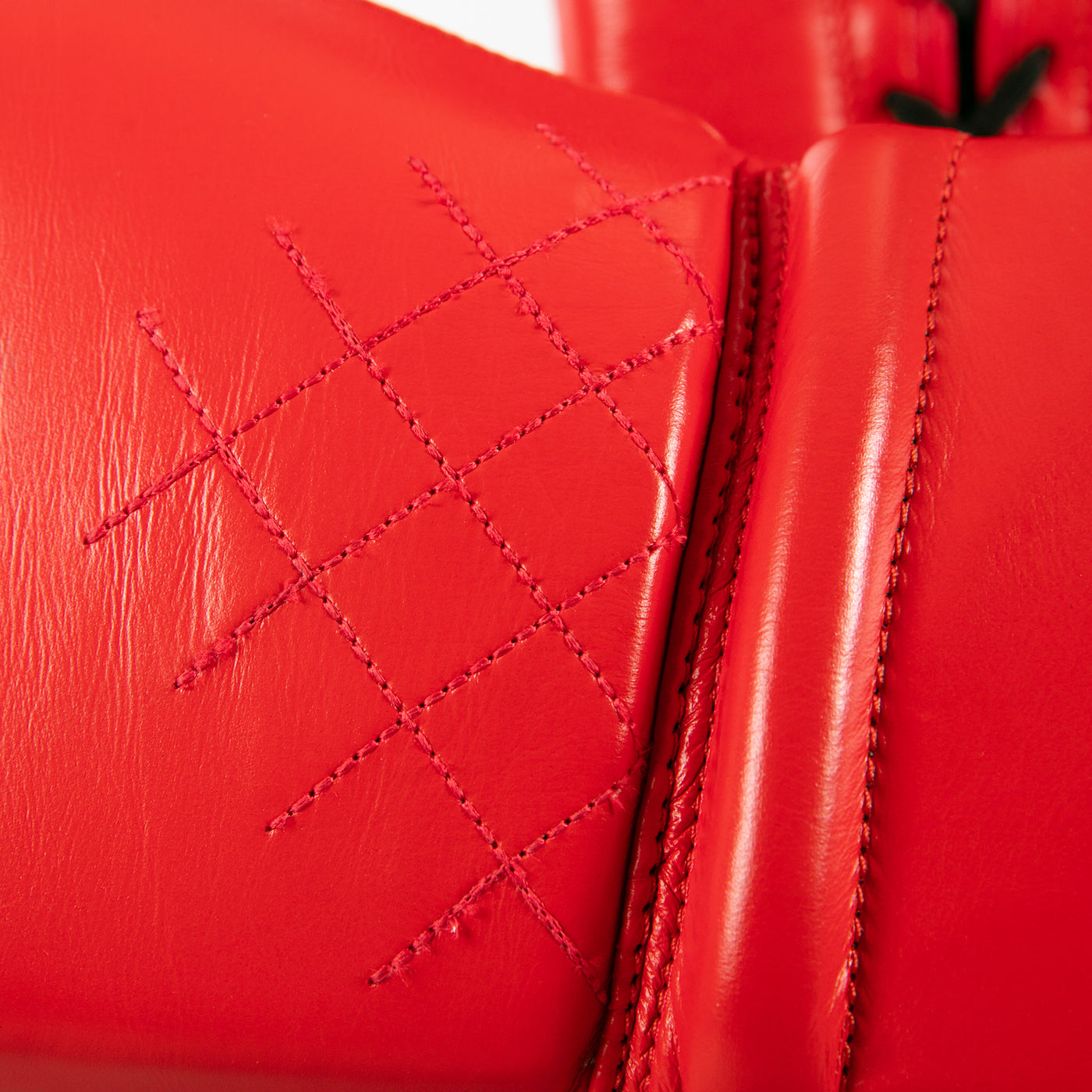 variant:red::TITLE Boxing Ko-Vert Sparring Boxing Gloves closeup of stitching