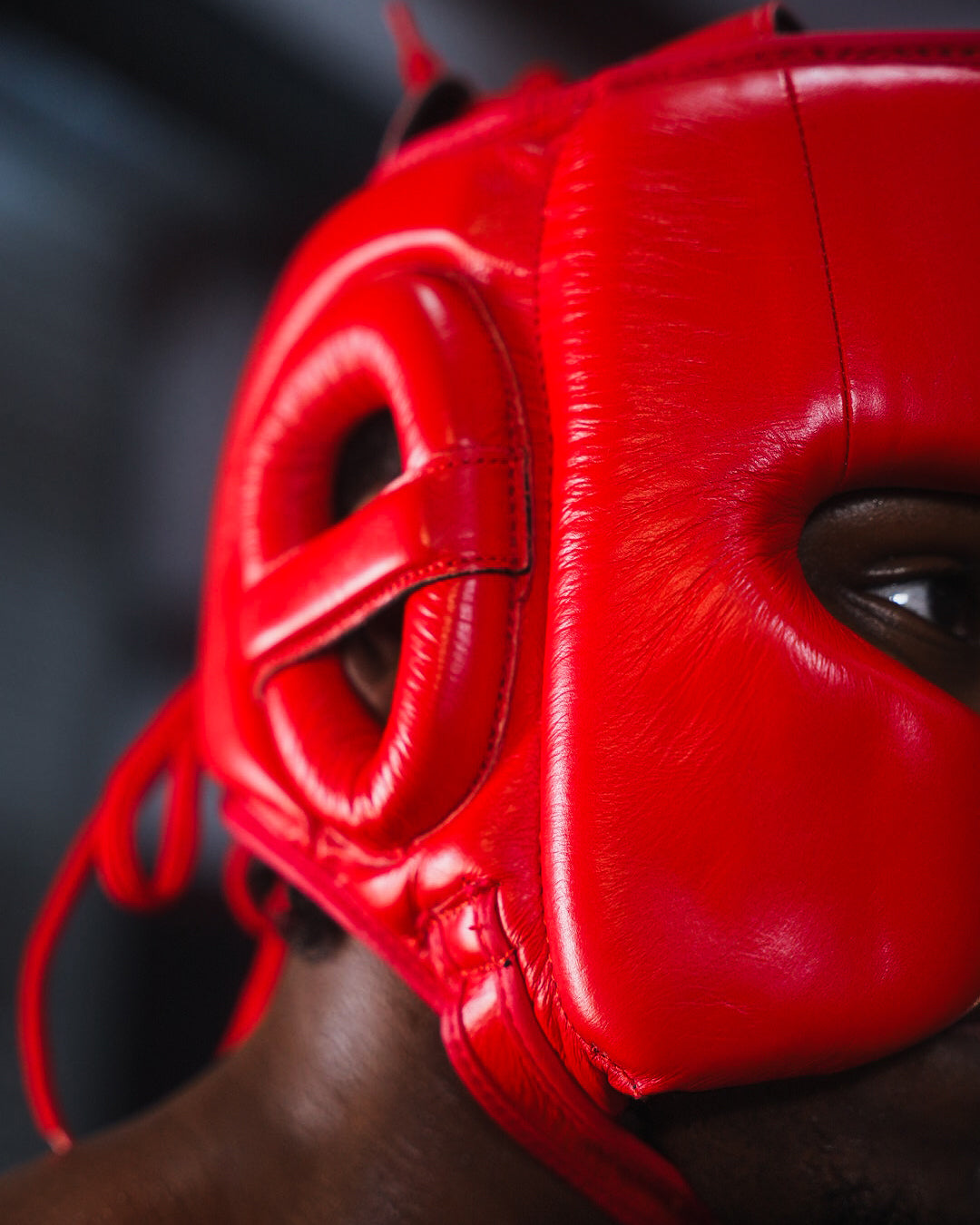 variant:red::TITLE Boxing KO-Vert Stealth Headgear on boxer closeup of side