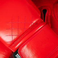 variant:red::TITLE Boxing Ko-Vert Training Boxing Gloves closeup of stitching
