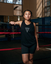 variant:black::TITLE Boxing Current Women's Tank girl in ring on rope