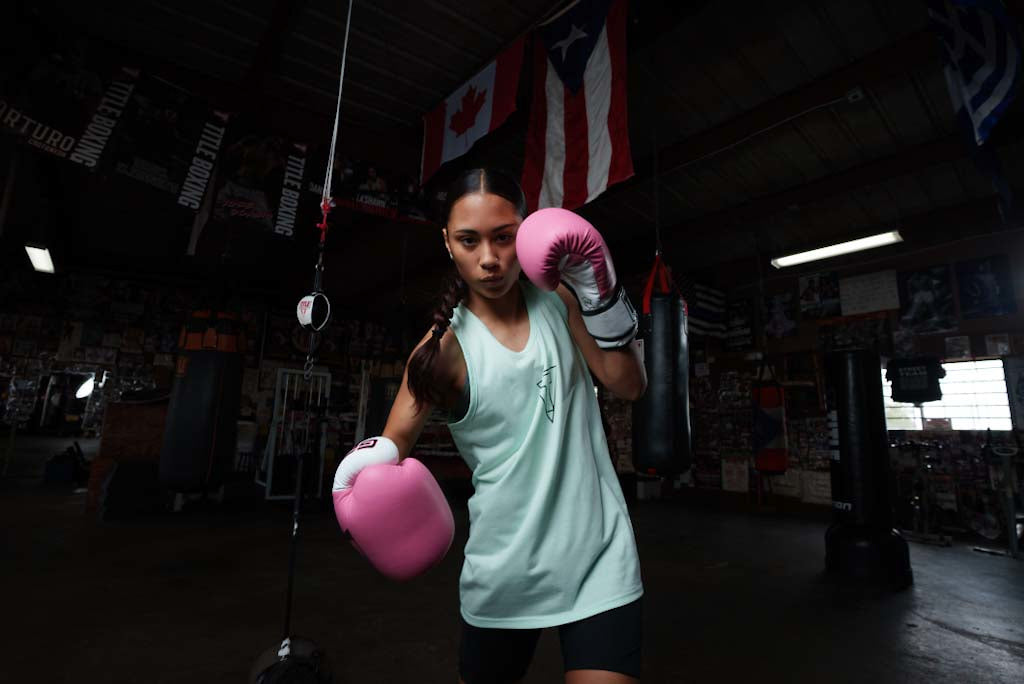 variant:green::TITLE Boxing Current Women's Tank girl with pink gloves boxing stance