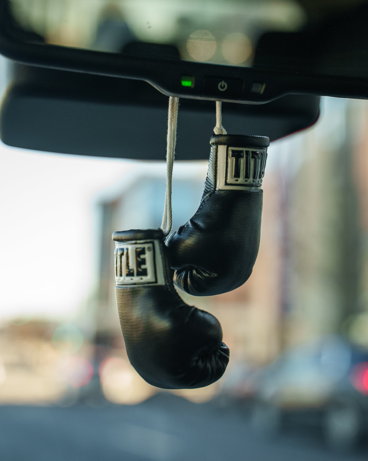 variant:black::TITLE Boxing 3.5” Mini Boxing Gloves hanging rearview mirror