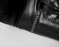 variant:black::TITLE Boxing Momentum Pro Sparring Gloves closeup of stitching
