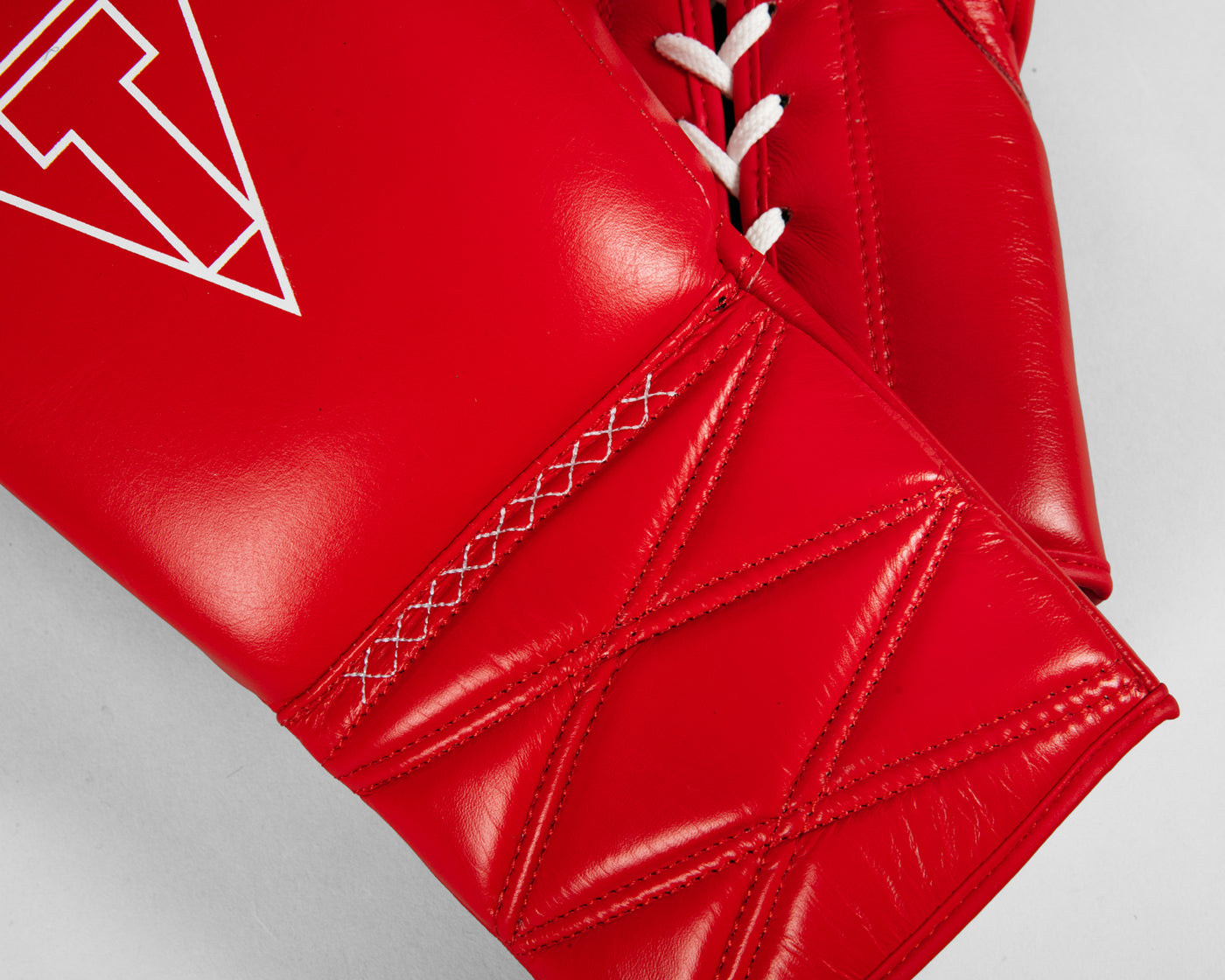 variant:red::TITLE Boxing Momentum Pro Sparring Gloves closeup of gloves
