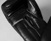 variant:black::TITLE Boxing Momentum Pro Training Gloves closeup of palm side