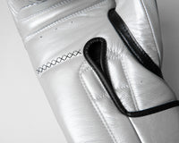 variant:silver/black::TITLE Boxing Momentum Pro Training Gloves closeup of stitching