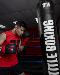 variant:lifestyle::TITLE Boxing Synthetic Heavy Bag in the gym closeup bag view