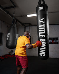 variant:lifestyle::TITLE Boxing Synthetic Heavy Bag being punched
