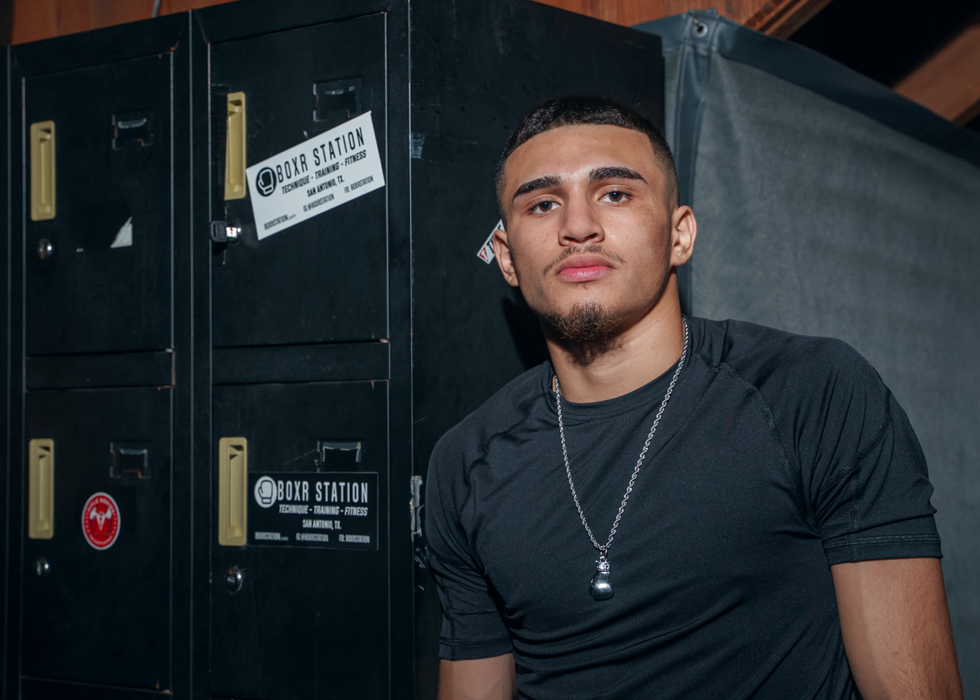 variant:silver::TITLE Boxing Single Glove Necklace kid wearing on neck