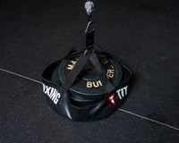 variant:lifestyle::TITLE Boxing Open-Face Bag Anchor with weight inside it