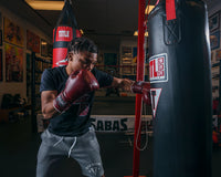 variant:maroon::TITLE Boxing Old School Leather Sparring Gloves 2.0  left hook to bag