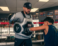 variant:lifestyle::TITLE Platinum Body Protector kid punching body shield