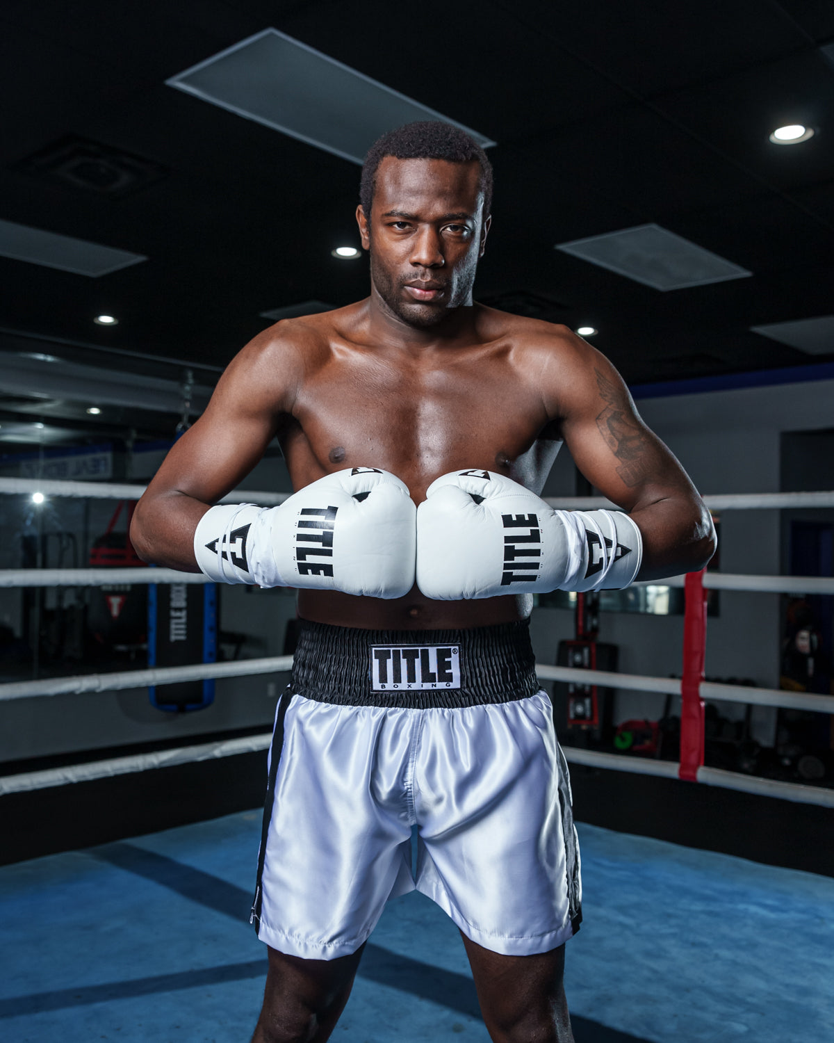 variant:white/black::TITLE Boxing Leather Pro Fight Gloves hands together
