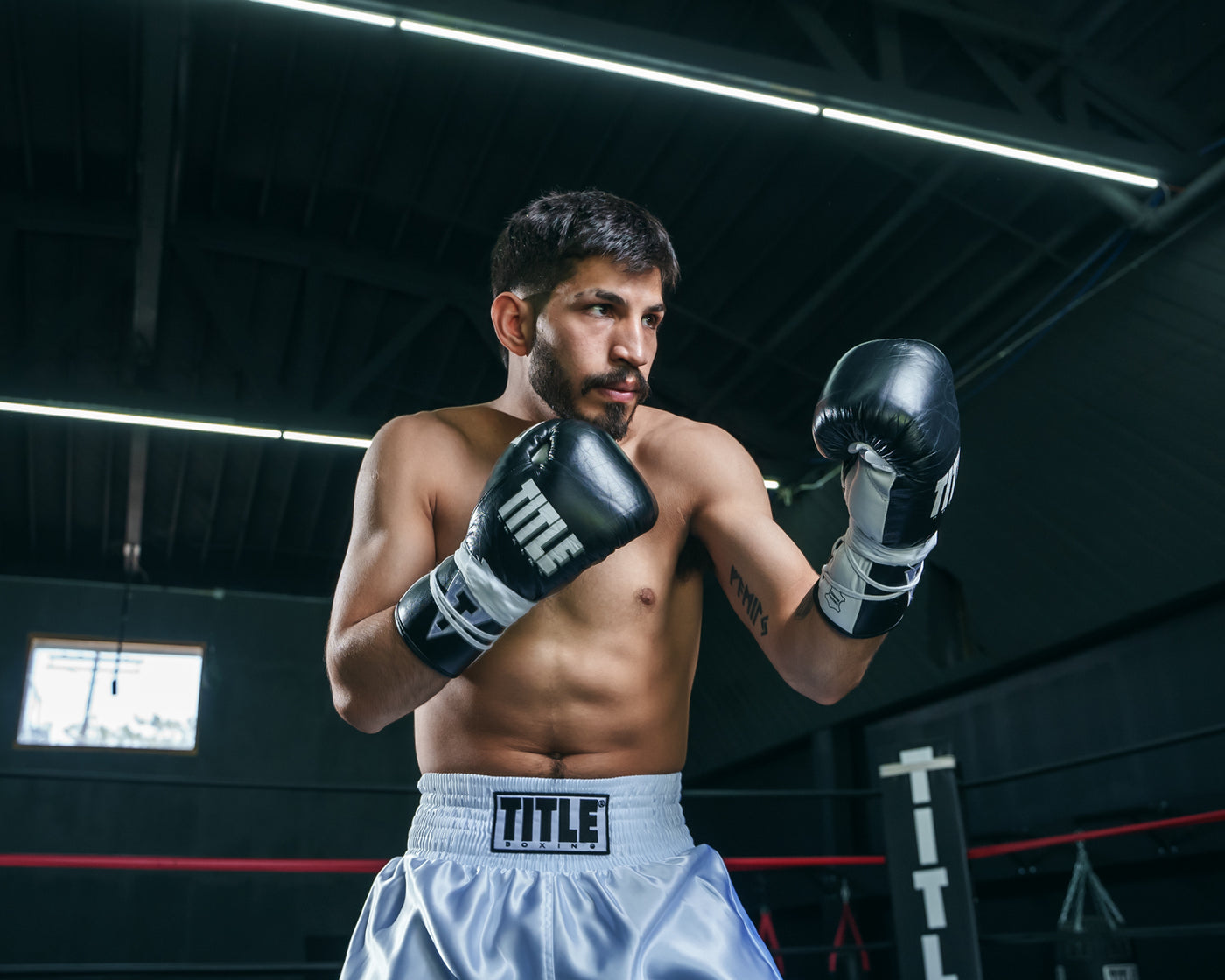 variant:Black/White::TITLE Boxing Leather Pro Fight Gloves side view