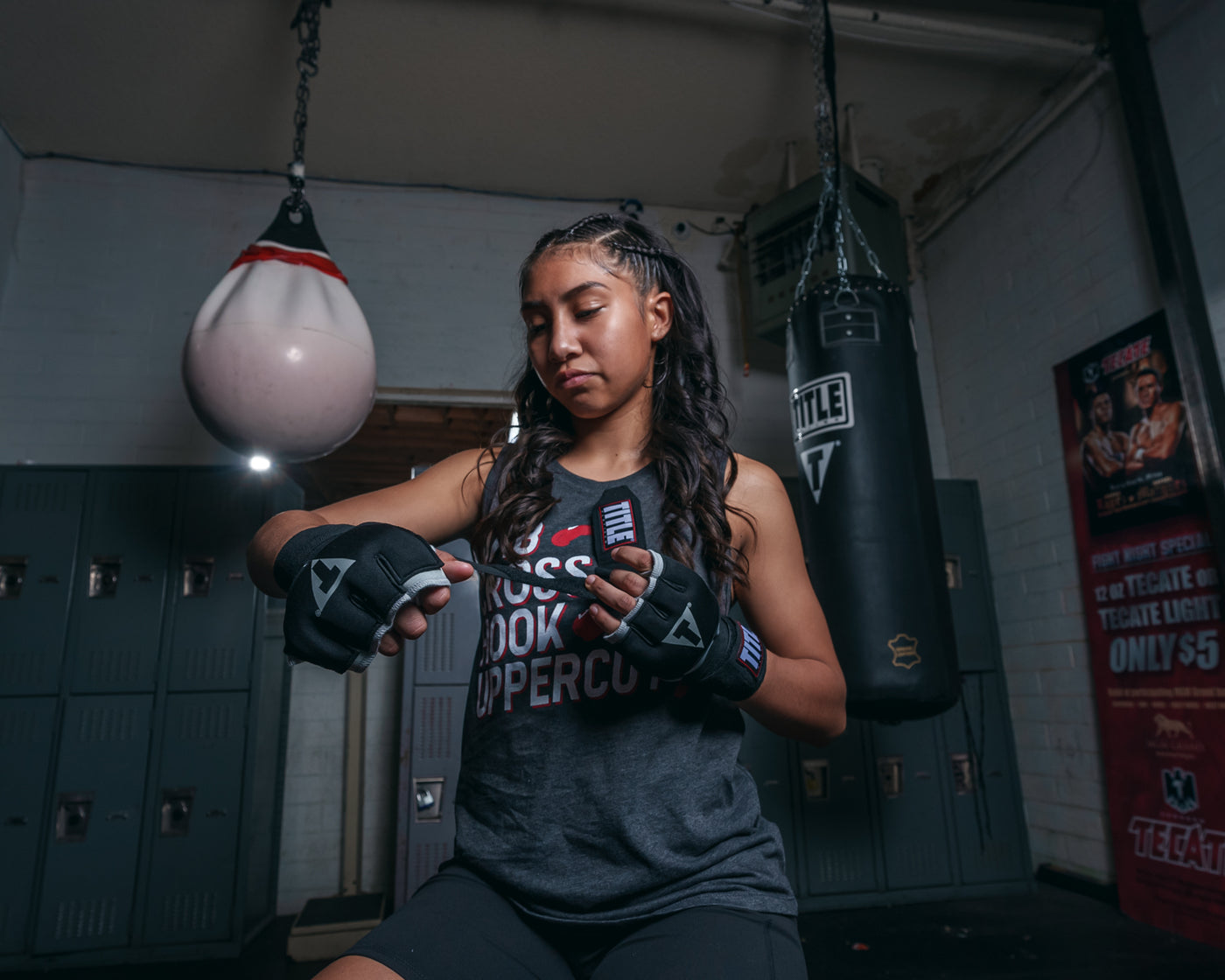 variant:lifestyle::TITLE Platinum Prime Gel Fist Wraps 2.0 girl putting on 