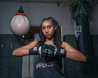 variant:lifestyle::TITLE Platinum Prime Gel Fist Wraps 2.0 girl hands together