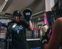 variant:lifestyle::TITLE Platinum Prolific Punch Mitts coach  mitts up