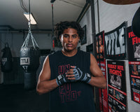 variant:lifestyle::TITLE Platinum 180" Semi Elastic Hand Wraps guy standing hands together