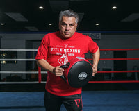 variant:lifestyle::Pro Mex Accuracy Leather Pro Punch Shield 2.0 coach holding punch shield