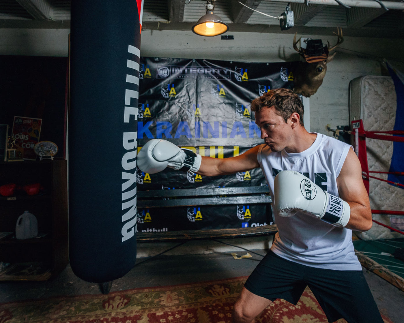 variant:White::Pro Mex Professional Bag Gloves V3.0 guy hit the bag