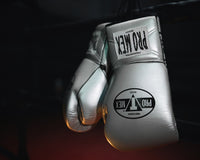 variant:silver::Pro Mex Professional Edge Lace Training/Sparring Boxing Gloves hanging